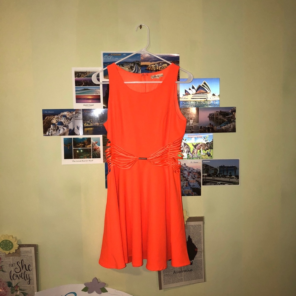 orange skater dress with side cut outs